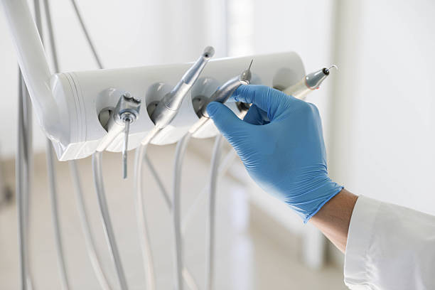 Professional Dental Implants technician working in Cortland, NY